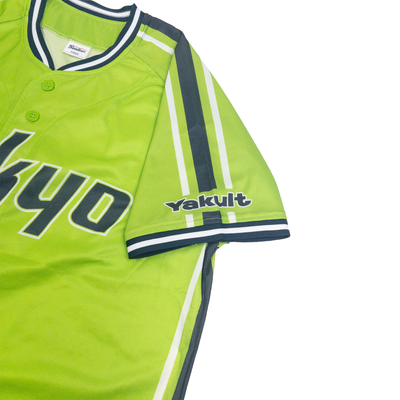 Green baseball jersey with 'Yakult' branding on a white background